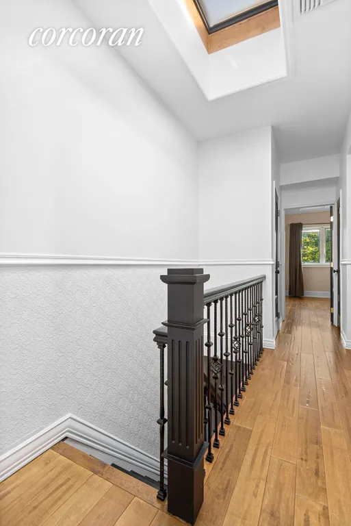 New York City Real Estate | View 1245 81st Street | Staircase and skylight | View 13