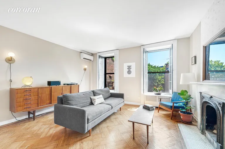 New York City Real Estate | View 30 Remsen Street, 3b | Open south facing living room with WBFP  | View 3