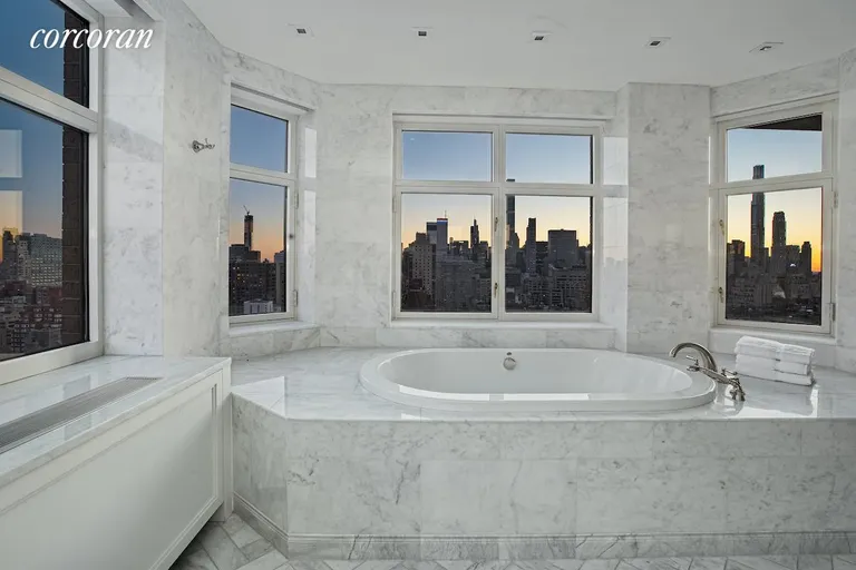 New York City Real Estate | View 188 East 76th Street, 28FL | Primary Bath at Sunset | View 24