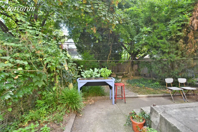 New York City Real Estate | View 105 Clermont Avenue | Inviting garden area | View 12