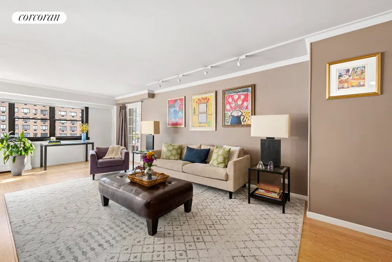 New York City Real Estate | View 235 East 87th Street, 10C | Great sized living room with track lighting | View 3