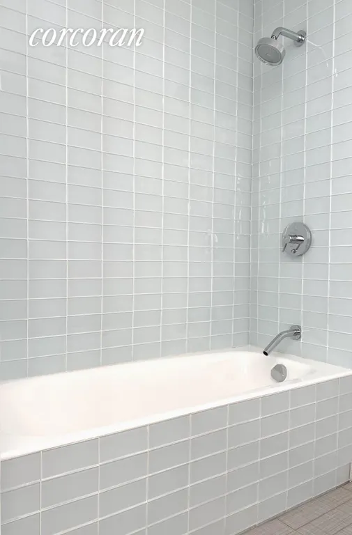 New York City Real Estate | View 447 West 18th Street, 3E | Tub with Shower in Guest Bathroom | View 11