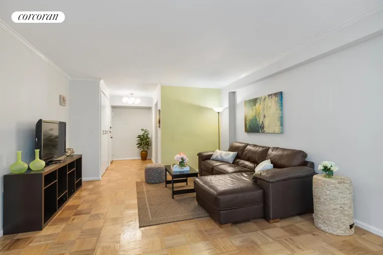 New York City Real Estate | View 225 East 57th Street, 4N | Large Entry Foyer & Living Room  | View 2