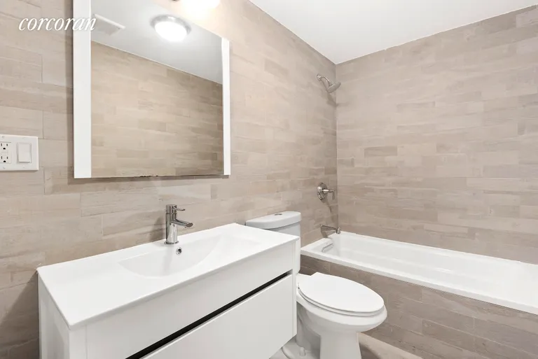 New York City Real Estate | View 81A Menahan Street | Lower Level Bathroom | View 13