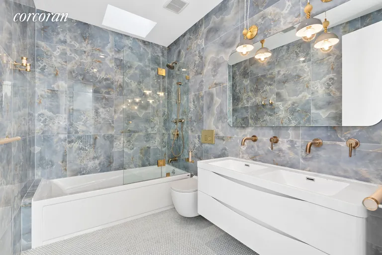 New York City Real Estate | View 407 Quincy Street | Shared bathroom with deep soaking tub! | View 12