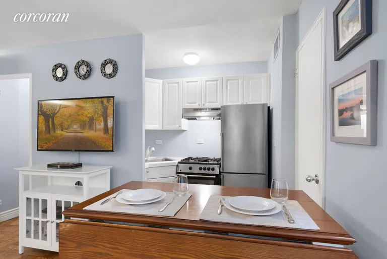 New York City Real Estate | View 233 East 69th Street, 5O | Stainless steel separate kitchen | View 4