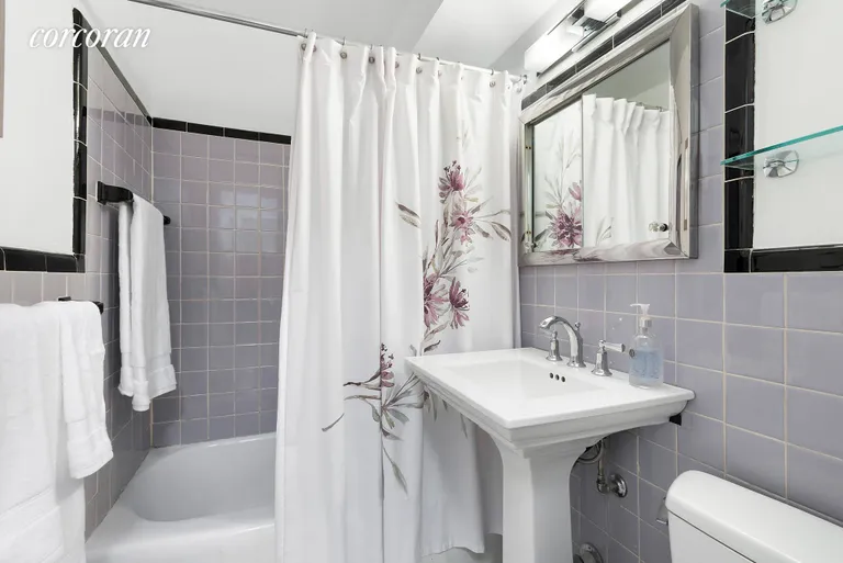 New York City Real Estate | View 233 East 69th Street, 5O | Updated bathroom | View 5