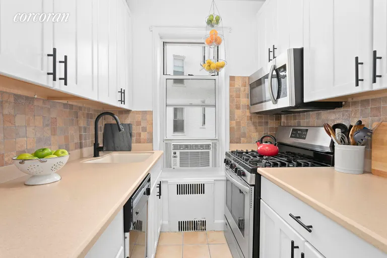New York City Real Estate | View 60 Plaza Street East, 3E | The windowed kitchen has full-sized appliances. | View 3
