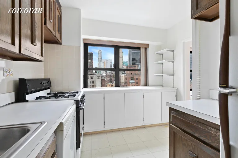 New York City Real Estate | View 160 East 38th Street, 17D | Sun-filled Kitchen with Large Windows | View 3