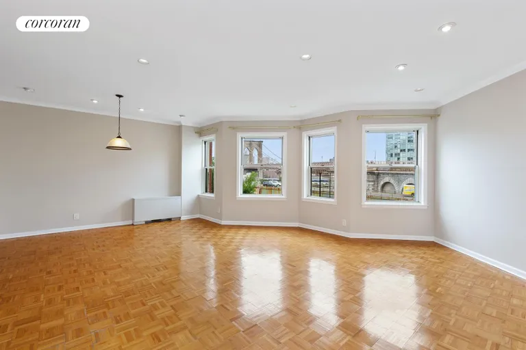 New York City Real Estate | View 75 Poplar Street, 3E | Living Room, Dining Area & Bridge View | View 9