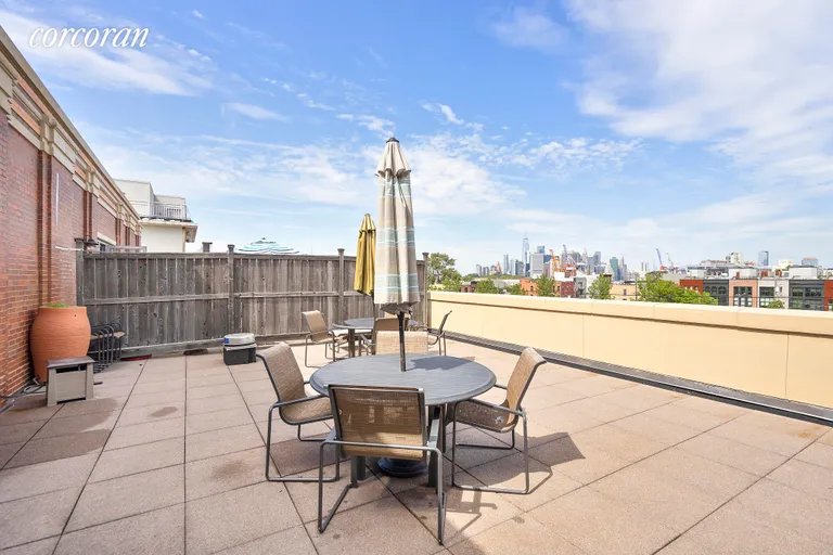 New York City Real Estate | View 79 Wolcott Street, 205B | Shared roof deck with Manhattan skyline views | View 6