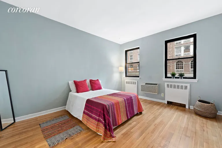 New York City Real Estate | View 230 East 52nd Street, 2A | Large Windowed Bedroom | View 3
