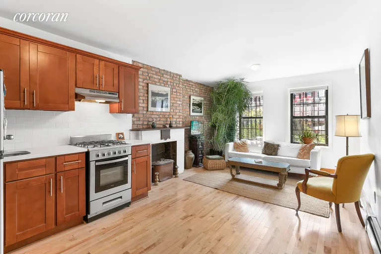 New York City Real Estate | View 671 Hancock Street | Garden Level Kitchen/Living | View 10