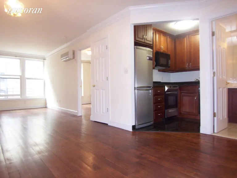 New York City Real Estate | View 57 East 77th Street | Hardwood floors, renovated kitchen | View 8