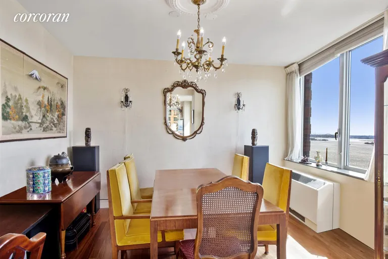New York City Real Estate | View 30 West Street, 24A | Dining Room with River Views | View 2