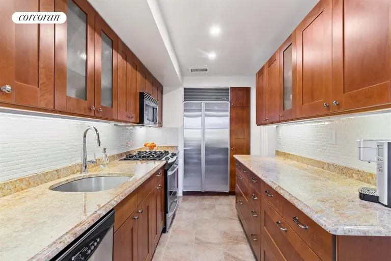 New York City Real Estate | View 225 East 57th Street, 16D | Beautifully Renovated Kitchen | View 3