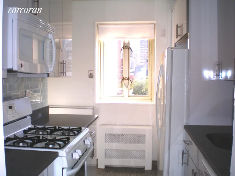 New York City Real Estate | View 166 East 63rd Street, 9C | 9C-Kitchen | View 4