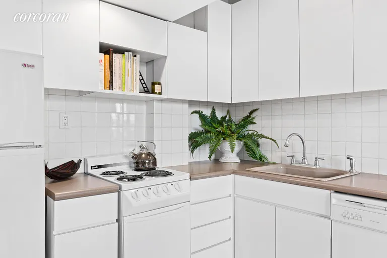 New York City Real Estate | View 140 West 69th Street, 115C | Kitchen | View 3