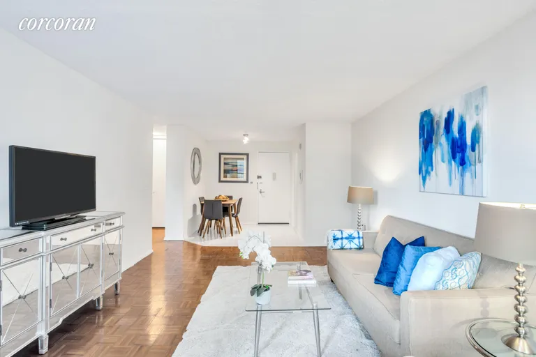 New York City Real Estate | View 301 East 79th Street, 11S | Living Room/Dining | View 3