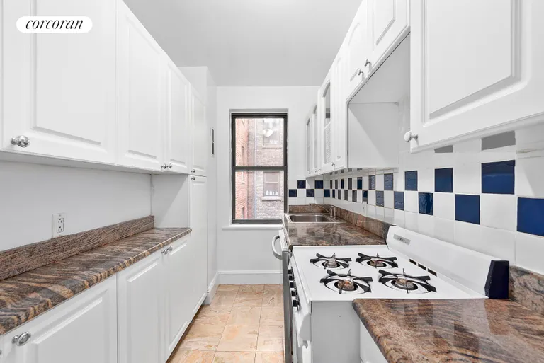 New York City Real Estate | View 308 West 30th Street, 5-F | Windowed kitchen with dishwasher and microwave. | View 2