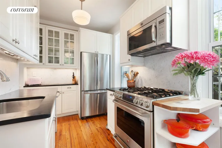 New York City Real Estate | View 1409 Albemarle Road, 2A | Bright kitchen with 3 large windows | View 2