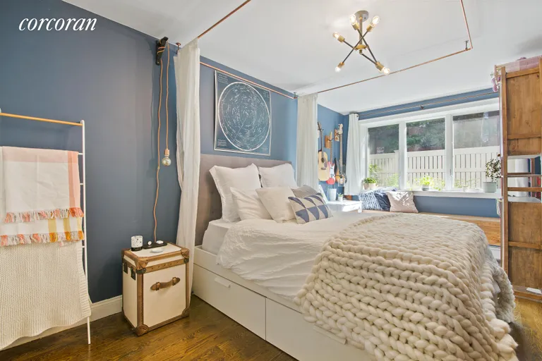 New York City Real Estate | View 1138 Ocean Avenue, 1E | Primary with white picket fence garden views. | View 4