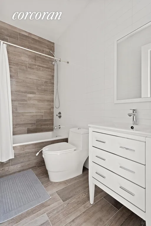 New York City Real Estate | View 1152 Halsey Street | Hall bath with a sleek modern design | View 13