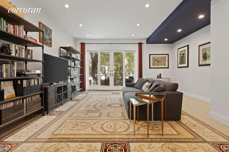 New York City Real Estate | View 1152 Halsey Street | Massive living room opens up the the deck beyond | View 4