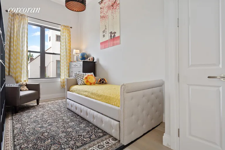 New York City Real Estate | View 1152 Halsey Street | Well sized third bedroom with vaulted ceilings | View 12
