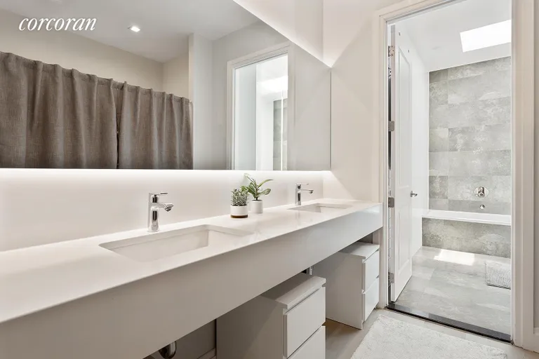 New York City Real Estate | View 1152 Halsey Street | Floating double sink vanity in master en suite | View 9