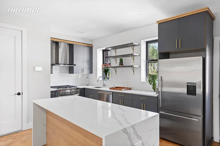 New York City Real Estate | View 336 East 26th Street | Designer chef's kitchen with large island! | View 4