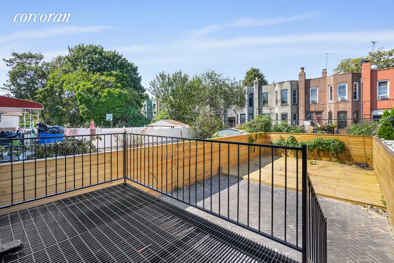 New York City Real Estate | View 336 East 26th Street | Metal deck overlooking the lush garden! | View 6