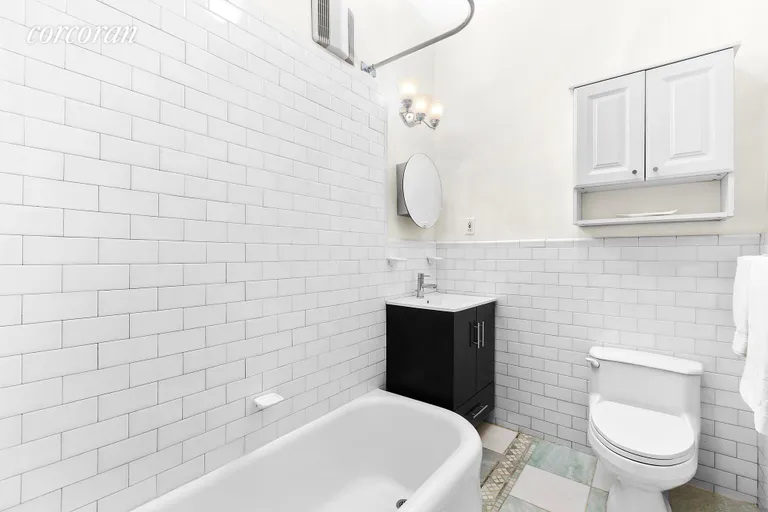 New York City Real Estate | View 111 West 11th Street, 1FW | Bathroom with Modern Fixtures | View 5
