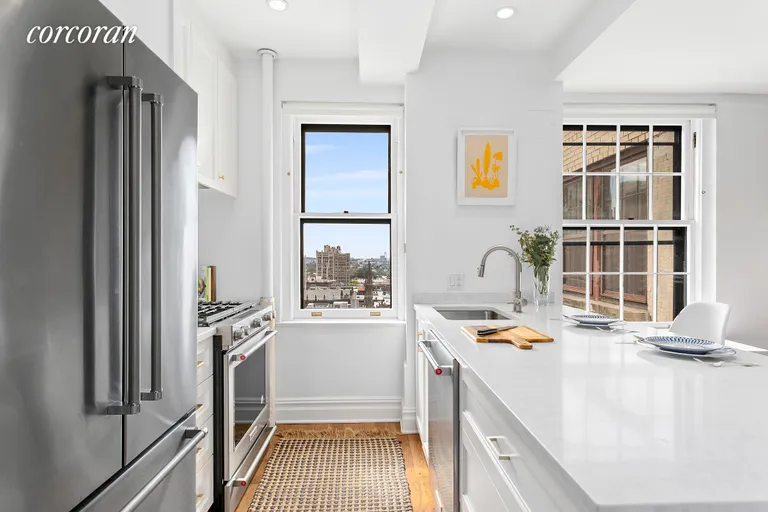 New York City Real Estate | View 24 MONROE PLACE, 12D | Kitchen with Views | View 6