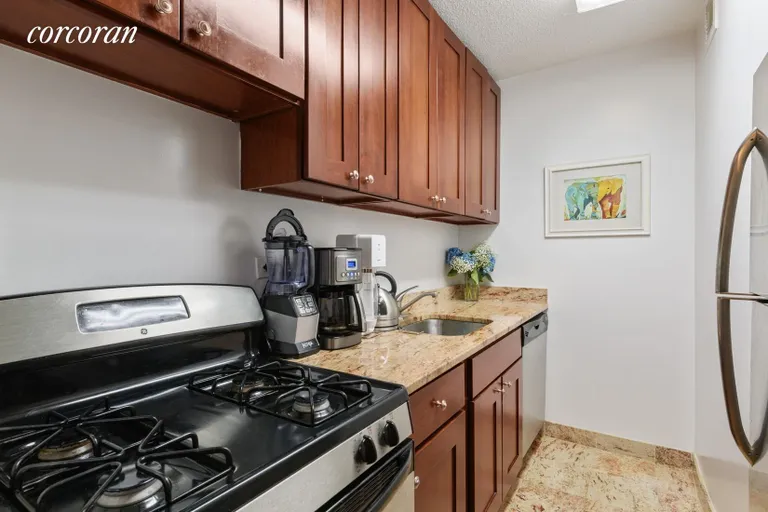 New York City Real Estate | View 347 West 57th Street, 15B | Renovated kitchen with dishwasher | View 2