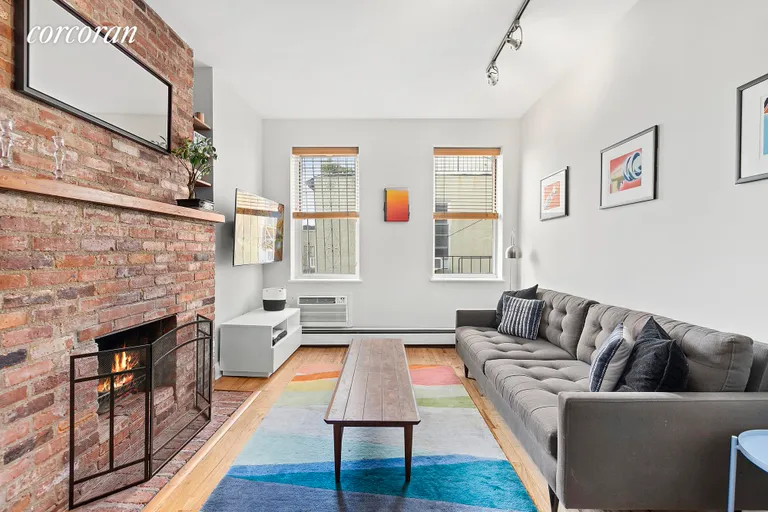 New York City Real Estate | View 288 5th Avenue, 4R | Cozy up to your wood-burning fireplace! | View 3