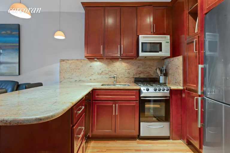 New York City Real Estate | View 160 East 26th Street, 3B | The kitchen is  outfitted with exquisite finishes | View 8