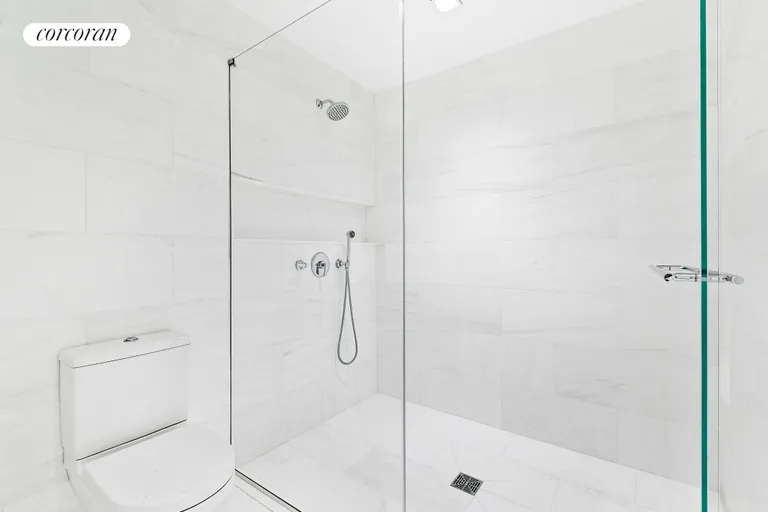 New York City Real Estate | View 27 North Moore Street, PHB | Giant glass-enclosed  shower | View 10