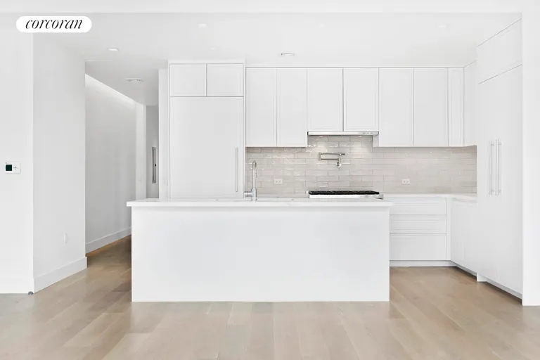 New York City Real Estate | View 27 North Moore Street, PHB | Breakfast bar seats four, sprawling cabinet space | View 6