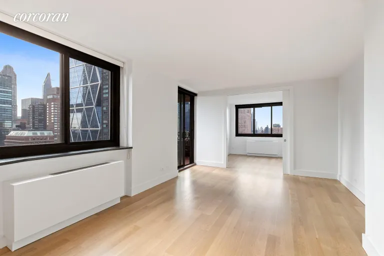 New York City Real Estate | View 347 West 57th Street, 36D | Spacious living room has been converted to two bed | View 4