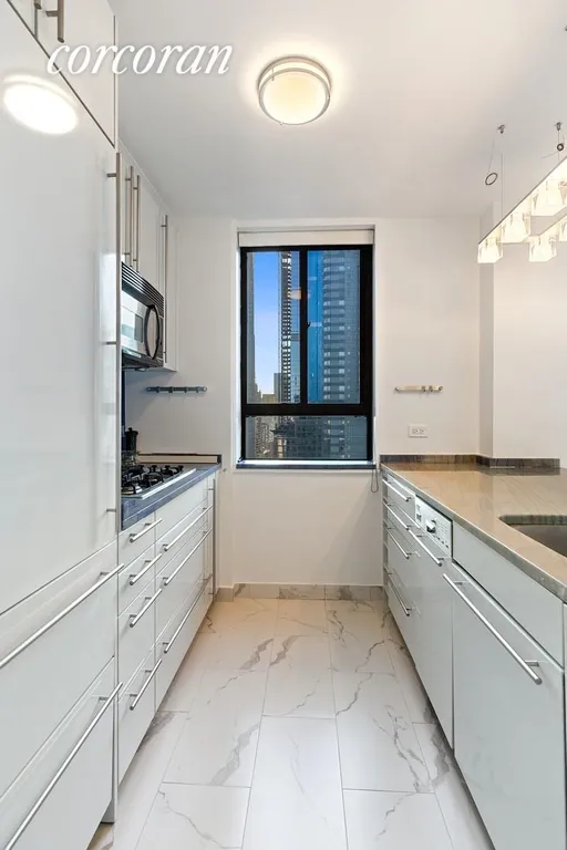 New York City Real Estate | View 347 West 57th Street, 36D | Windowed Kitchen | View 10