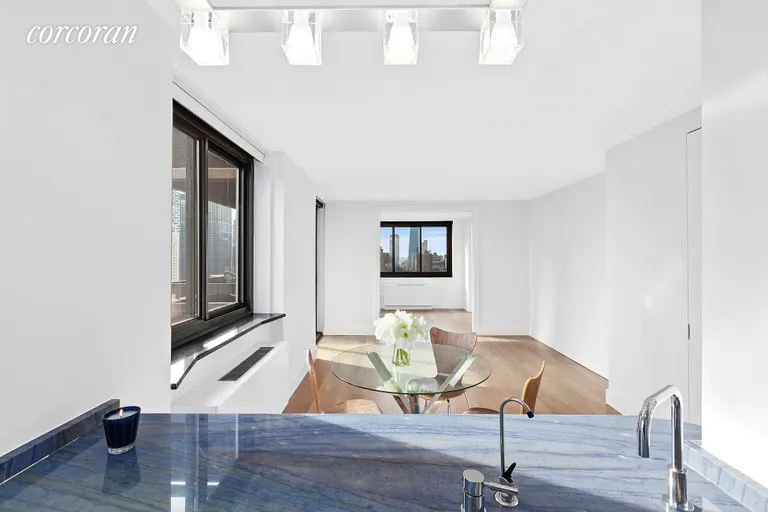 New York City Real Estate | View 347 West 57th Street, 36D | Open Kitchen to dining area | View 11