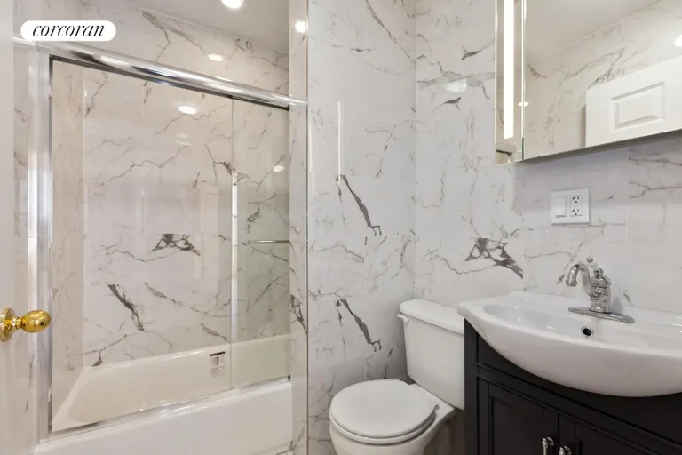 New York City Real Estate | View 408 Saint Johns Place, 5C | Hall bath with tub and shower | View 6