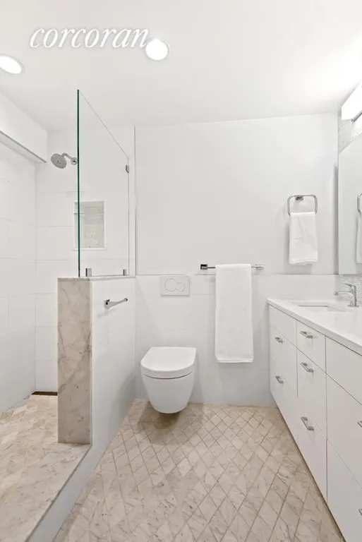 New York City Real Estate | View 45 East 25th Street, 15D | white marble master bath  | View 6