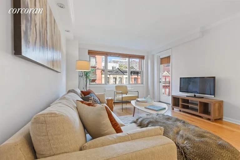 New York City Real Estate | View 400 East 77th Street, 6A | Living Room with Street View | View 3