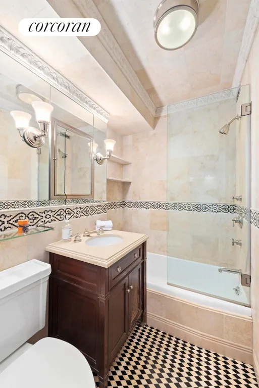 New York City Real Estate | View 30 East 62nd Street, 2H | Luxurious bathroom with marble appointments | View 6