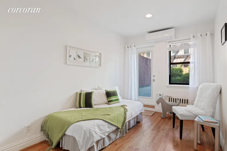 New York City Real Estate | View 41 Park Place, 1 | Second bedroom with access to yard | View 7