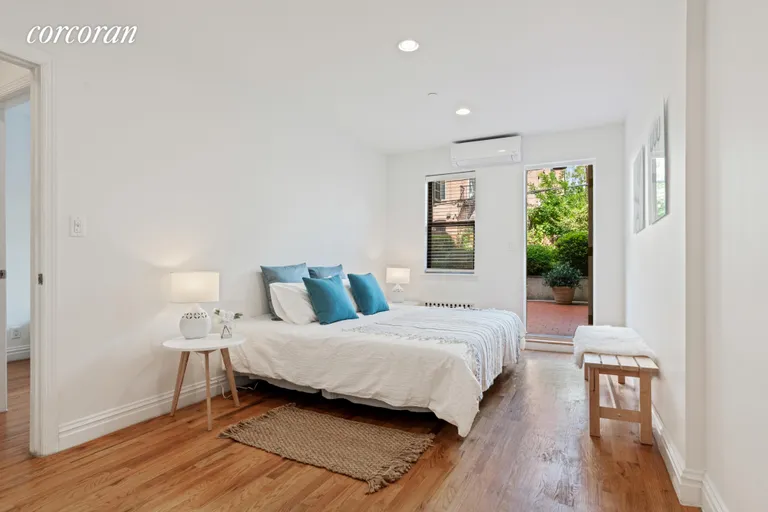 New York City Real Estate | View 41 Park Place, 1 | Large Ensuite Primary Bed w access to private yard | View 5