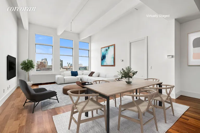 New York City Real Estate | View 60 Broadway, 10F | Living / Dining Rooms with excellent light and vie | View 3