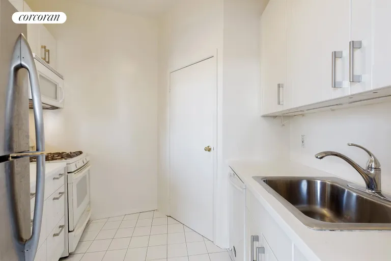 New York City Real Estate | View 75 Poplar Street, 2K | Kitchen with washer dryer | View 3